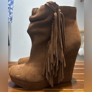Express tan fringe wedge bootie, size 7. Zipper inside